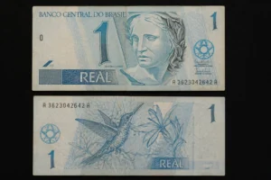 Cédula de 1 Real Pode Valer Muito em 2026 1 A cédula de 1 real foi uma das primeiras notas do Plano Real. - Fonte: Imagem gerada por IA (DALL·E / ChatGPT)